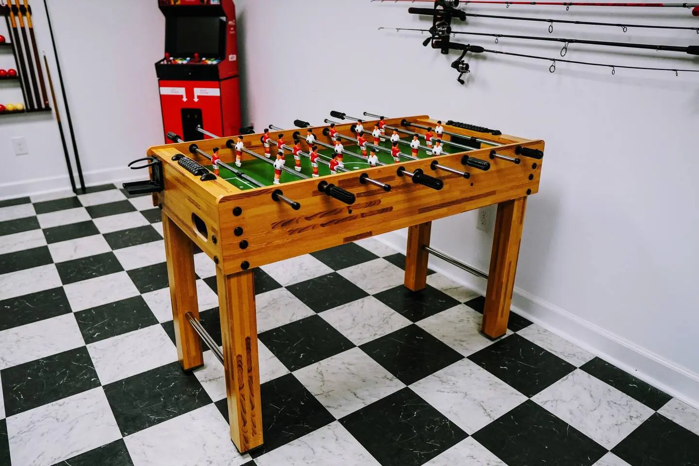 Foosball table in the checkered-floor game room